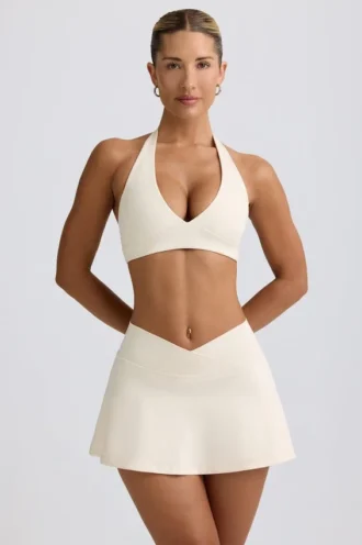 Mini-jupe-short croisée en jersey brossé marbré ivoire