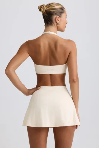 Mini-jupe-short croisée en jersey brossé marbré ivoire