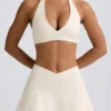 Mini-jupe-short croisée en jersey brossé marbré ivoire Mini-jupe-short croisée en jersey brossé marbré ivoire