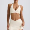 Mini-jupe-short croisée en jersey brossé marbré ivoire Mini-jupe-short croisée en jersey brossé marbré ivoire