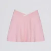 Mini-jupe-short croisée Soft Active en rose poudré Mini-jupe-short croisée Soft Active en rose poudré