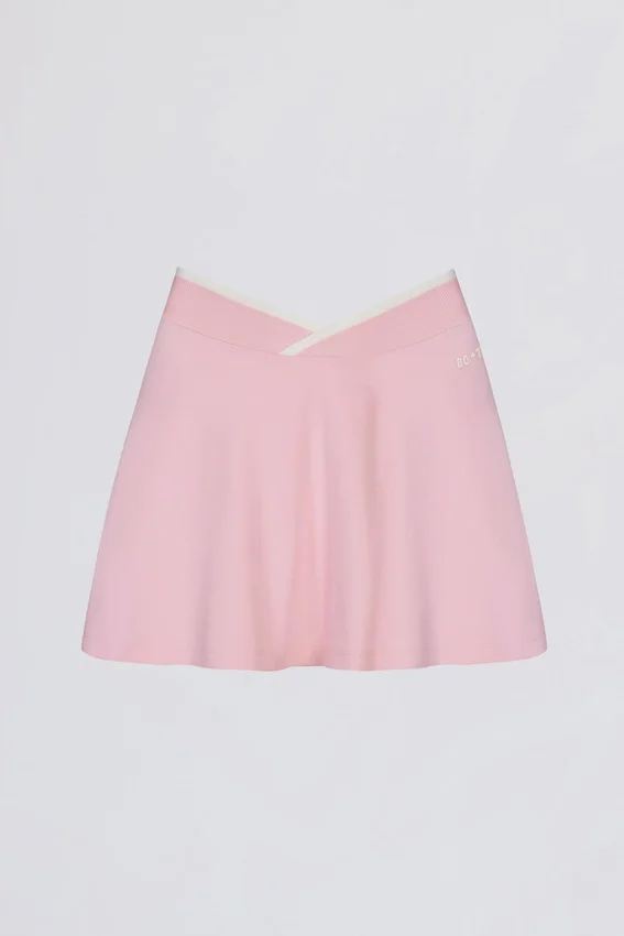 Mini-jupe-short croisée Soft Active en rose poudré Mini-jupe-short croisée Soft Active en rose poudré