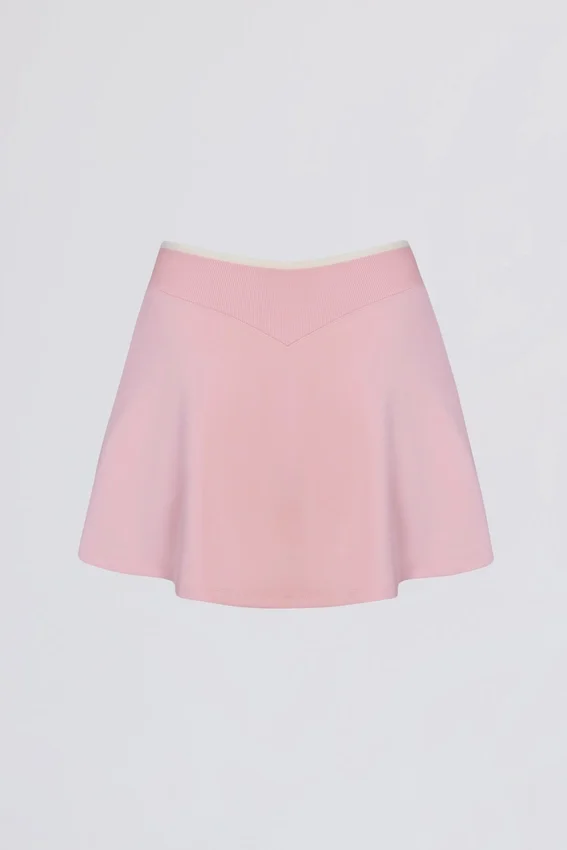 Mini-jupe-short croisée Soft Active en rose poudré Mini-jupe-short croisée Soft Active en rose poudré