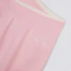 Mini-jupe-short croisée Soft Active en rose poudré Mini-jupe-short croisée Soft Active en rose poudré