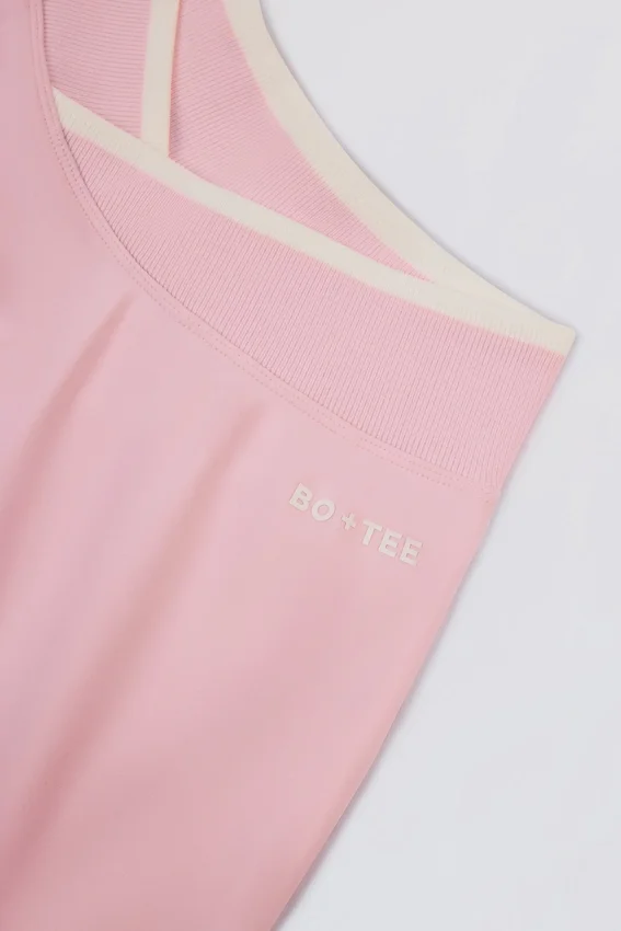 Mini-jupe-short croisée Soft Active en rose poudré Mini-jupe-short croisée Soft Active en rose poudré