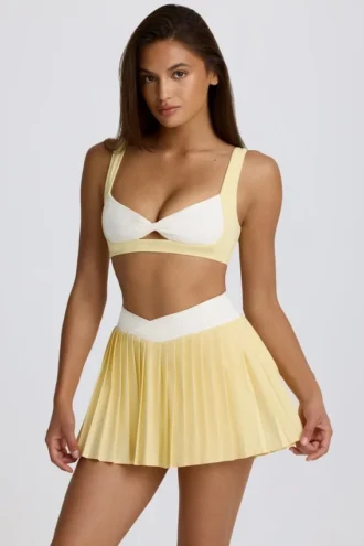 Mini-jupe-short plissée Soft Active à croisement, couleur citron