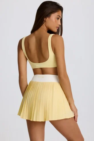 Mini-jupe-short plissée Soft Active à croisement, couleur citron