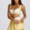 Mini-jupe-short plissée Soft Active à croisement, couleur citron Mini-jupe-short plissée Soft Active à croisement, couleur citron