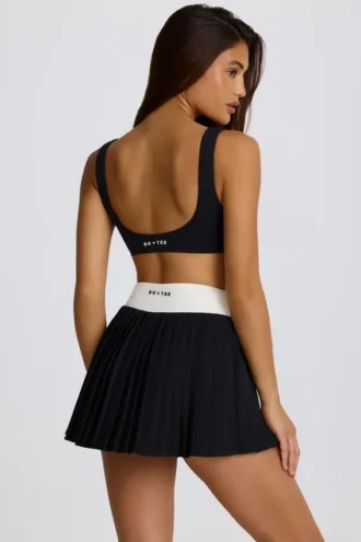 Mini-jupe-short plissée Soft Active Crossover en noir