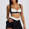 Mini-jupe-short plissée Soft Active Crossover en noir Mini-jupe-short plissée Soft Active Crossover en noir