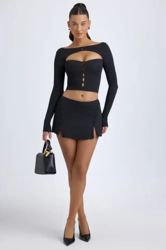 Mini-jupe taille basse Dalla en modal avec boutons, couleur noire