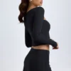 Mini-jupe taille basse Dalla en modal avec boutons, couleur noire Mini-jupe taille basse Dalla en modal avec boutons, couleur noire