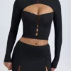 Mini-jupe taille basse Dalla en modal avec boutons, couleur noire Mini-jupe taille basse Dalla en modal avec boutons, couleur noire