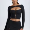 Mini-jupe taille basse Dalla en modal avec boutons, couleur noire Mini-jupe taille basse Dalla en modal avec boutons, couleur noire