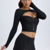 Mini-jupe taille basse Dalla en modal avec boutons, couleur noire Mini-jupe taille basse Dalla en modal avec boutons, couleur noire