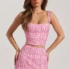 Mini-jupe taille basse ornée Jianna en rose