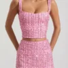 Mini-jupe taille basse ornée Jianna en rose