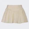 Mini-jupe Thia à nœud en broderie anglaise ivoire Mini-jupe Thia à nœud en broderie anglaise ivoire