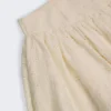 Mini-jupe Thia à nœud en broderie anglaise ivoire Mini-jupe Thia à nœud en broderie anglaise ivoire