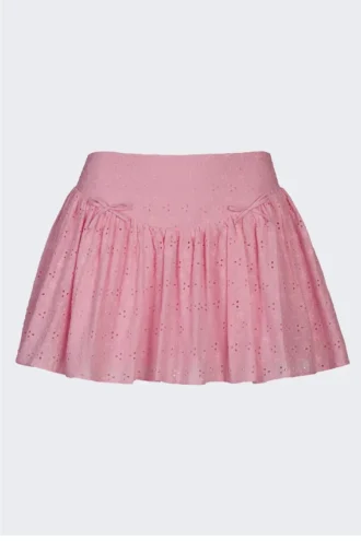 Mini-jupe Thia à nœud et broderie anglaise, rose pâle
