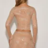 Mini-jupe évasée à taille mi-haute Nolene ornée, couleur amande