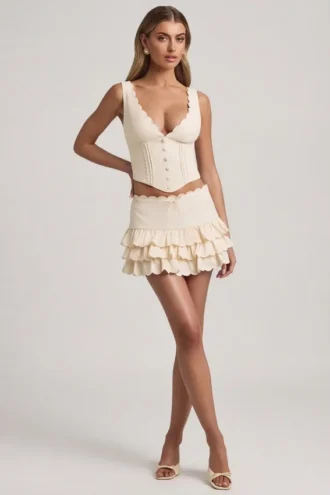 Mini-jupe à volants superposés et taille basse Lorena, couleur ivoire