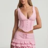 Mini-jupe à volants superposés et taille basse Lorena, rose pâle Mini-jupe à volants superposés et taille basse Lorena, rose pâle