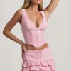 Mini-jupe à volants superposés et taille basse Lorena, rose pâle Mini-jupe à volants superposés et taille basse Lorena, rose pâle