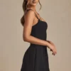 Mini-robe A-line plissée avec nœud Cressida en noir