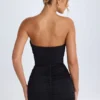 Mini-robe bandeau froncée Kalinda en noir Mini-robe bandeau froncée Kalinda en noir