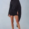 Mini-robe cape drapée Lida en noir Mini-robe cape drapée Lida en noir