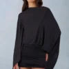 Mini-robe cape drapée Lida en noir Mini-robe cape drapée Lida en noir