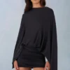 Mini-robe cape drapée Lida en noir Mini-robe cape drapée Lida en noir
