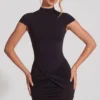 Mini-robe à col roulé en jersey Blair, dos nu froncé, en noir Mini-robe à col roulé en jersey Blair, dos nu froncé, en noir