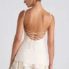 Mini-robe corset Cassandra à volants et boutons, couleur ivoire Mini-robe corset Cassandra à volants et boutons, couleur ivoire