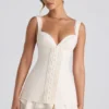 Mini-robe corset Cassandra à volants et boutons, couleur ivoire Mini-robe corset Cassandra à volants et boutons, couleur ivoire