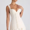 Mini-robe corset Cassandra à volants et boutons, couleur ivoire Mini-robe corset Cassandra à volants et boutons, couleur ivoire