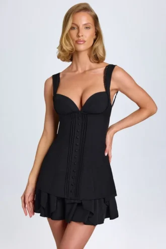 Mini-robe corset Cassandra à volants et boutons, en noir