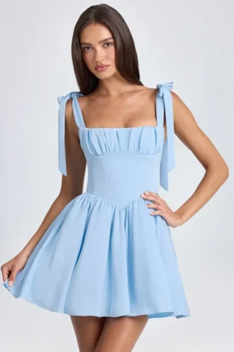 Mini-robe corset drapée Bellamy en bleu poudré