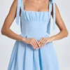 Mini-robe corset drapée Bellamy en bleu poudré Mini-robe corset drapée Bellamy en bleu poudré