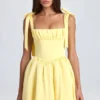 Mini-robe corset drapée Bellamy en Lemon Sherbet Mini-robe corset drapée Bellamy en Lemon Sherbet