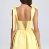 Mini-robe corset drapée Bellamy en Lemon Sherbet Mini-robe corset drapée Bellamy en Lemon Sherbet