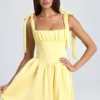 Mini-robe corset drapée Bellamy en Lemon Sherbet Mini-robe corset drapée Bellamy en Lemon Sherbet