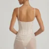 Mini-robe corset drapée semi-transparente avec ornements Connie, en blanc