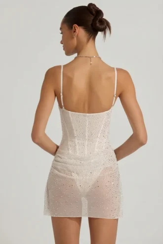 Mini-robe corset drapée semi-transparente avec ornements Connie, en blanc
