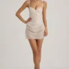 Mini-robe corset drapée semi-transparente avec ornements Connie, en blanc