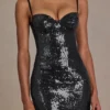 Mini-robe corset en dentelle à paillettes Theodora Premium, couleur noire Mini-robe corset en dentelle à paillettes Theodora Premium, couleur noire