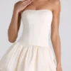 Mini-robe corset à lacets et ourlet bouffant Fabiola, couleur ivoire Mini-robe corset à lacets et ourlet bouffant Fabiola, couleur ivoire