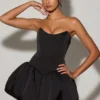 Mini-robe corset à lacets et ourlet bouffant Minerva, en noir Mini-robe corset à lacets et ourlet bouffant Minerva, en noir