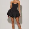 Mini-robe corset à lacets et ourlet bouffant Minerva, en noir Mini-robe corset à lacets et ourlet bouffant Minerva, en noir